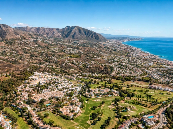 Aerial view of Mijas, Málaga, with mountains, golf courses, residential areas and the Mediterranean coast